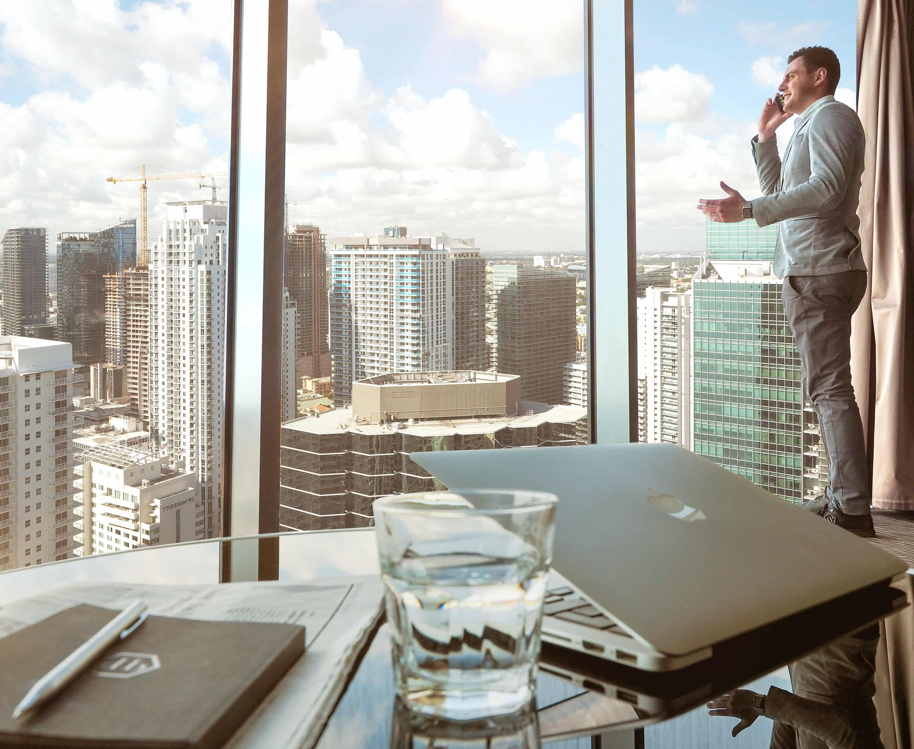 businessman-making-phone-call-in-city-office-p-3200